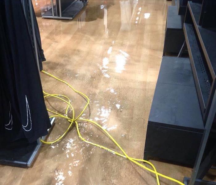 Water covers the floor of a retail commercial store